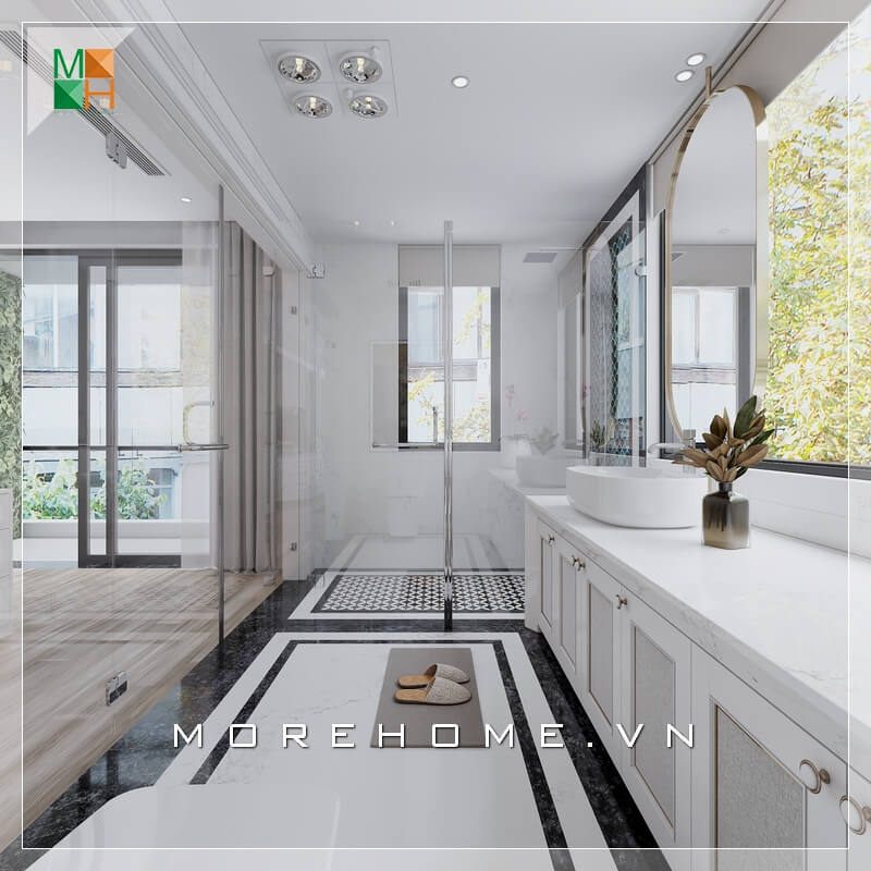 Thiết kế phòng tắm phong cách hiện đại với cửa kính cường lực giúp không gian thư giãn trở nên rộng rãi hơn.